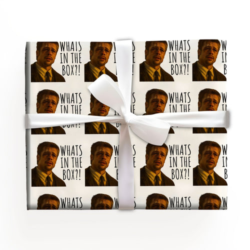 What is in the box Wrapping Paper with Holiday