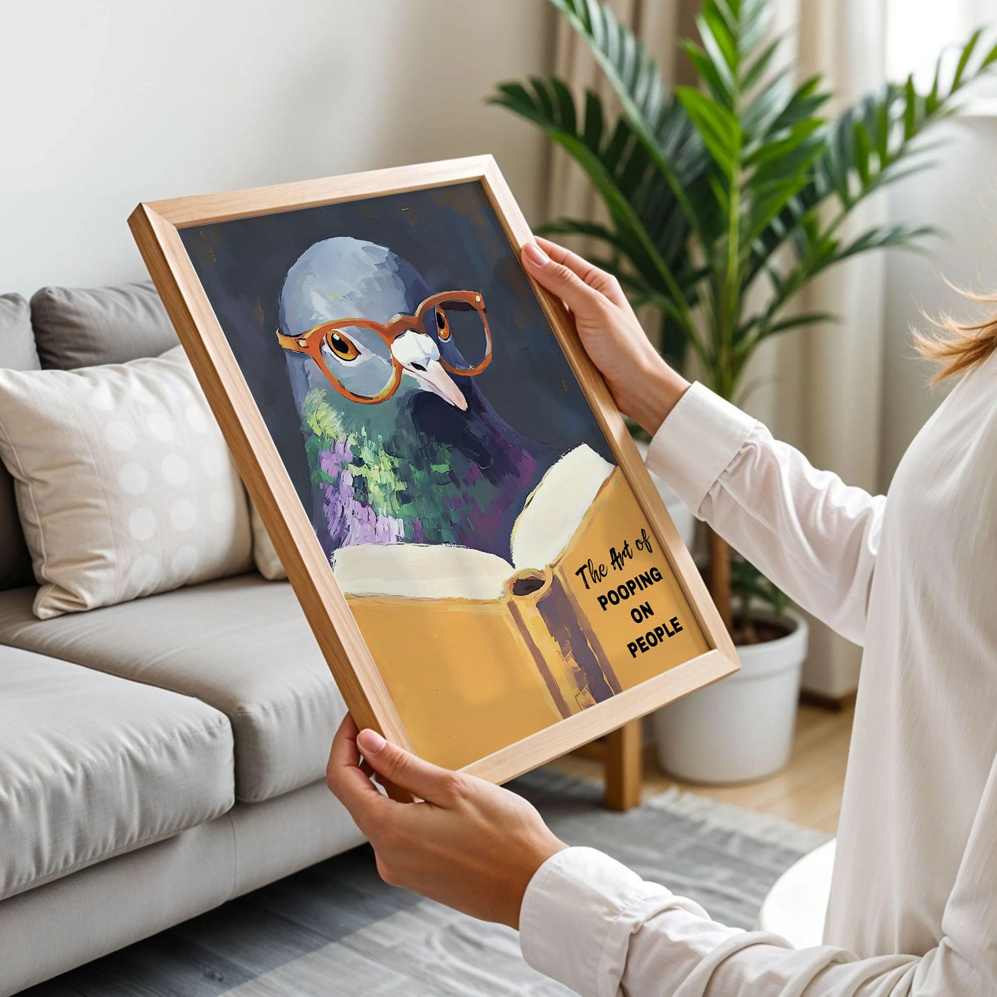 Humorous Pigeon Reading The Art of Pooping on People Poster